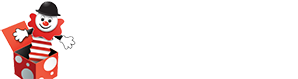 The Entertainer printed in white text, with the word 'the' rotated anticlockwise by 90 degrees to the left of the first E in 'Entertainer'. TheToyShop.com is printed, right-aligned, below the word 'Entertainer'. To the left, there is a jack-in-the-box with a red box with white polka dots, a black inside, and the inside of the lid is plain red. The figure coming out of the box has a horizontally striped red and white pattern on its spring, a white face with a smile, red nose, a black hat resembling a bowler hat, and a red decoration on the bottom half of its face resembling a cartoon depiction of a lion's mane. The figure also has short, black arms and white gloves with four fingers